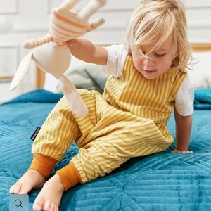 DockATot yellow gold romper. Size 18 -36 months